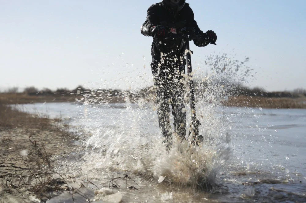 Riding in Summer Rain: What IP54 Really Means for Your KuKirin